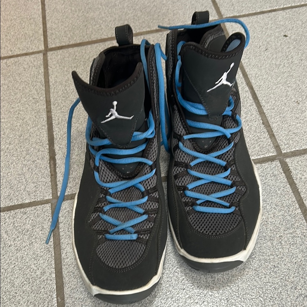 Jordan Black and Blue Athletic Shoes with High-Top Design